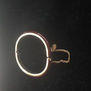 Vintage Hobé burgundy lucite, gold tone bangle bracelet.
